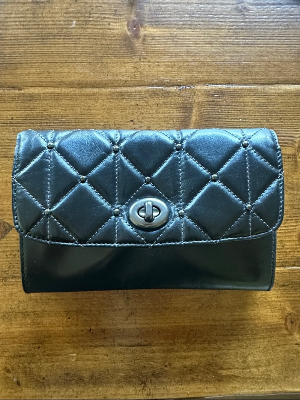 COACH Quilted Turn-Lock Women’s Leather Clutch - Black